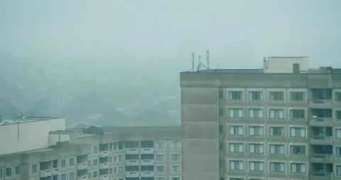 Fog close to the building roofs. Stock Footage 95863551