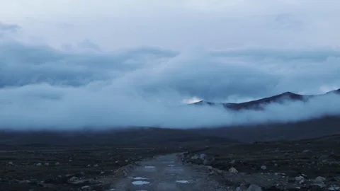 Fog coming down from the mountains in Peru landscape Stock Footage 229556611