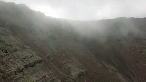Fog is coming down in sleeping volcano's crater aerial footage Stock Footage 85026281