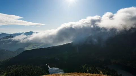 Fog coming over a mountain timelapse Stock Footage 171240147