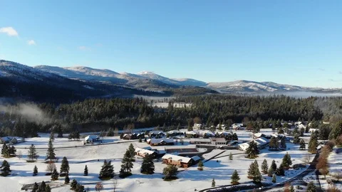 Fog Covered Snow Capped Mountains In Mountain Valley Aerial 4k Stock Footage 99165980