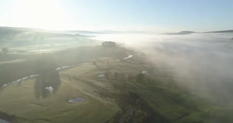 Fog covered valley Stock Footage 156194334