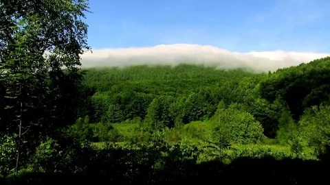 Fog covers a mountain Stock Footage 69084127