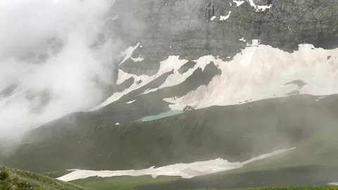 Fog drifting above White Abudelauri Lake Stock Footage 340387856