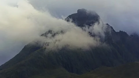 Fog Drifting Over a Mountain Peak During a Cold Polar Summer Time Lapse Stock Footage 345225481