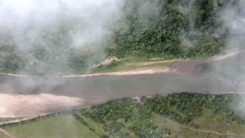 The fog flies over the river Stock Footage 137967592