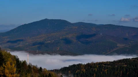 Fog floating in the valley Stock Footage 132255475