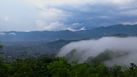 Fog flowing over the hill - time lapse Stock Footage 77608022