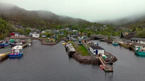 Fog Flowing Over Petty Harbour Hills Newfoundland Video stock 340927428