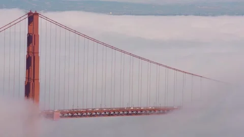 Fog Flowing Through Golden Gate Bridge in San Francisco Stock Footage 316644688