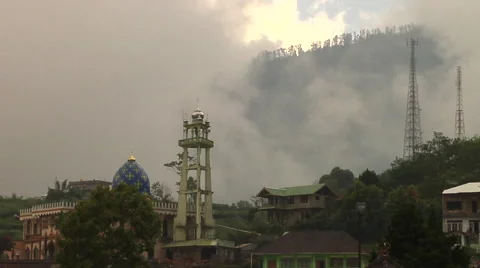 Fog getting to the temple in Bali Indonesia Stock Footage 41380585