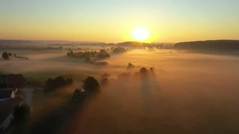 Fog morning over the plain and river floodplain of the meadow near a village Stock Footage 211966154