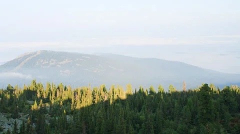 Fog motion in the mountains an sunrise Stock Footage 37570107
