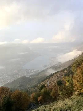 Fog in the mountains at sunset time Stock Photos