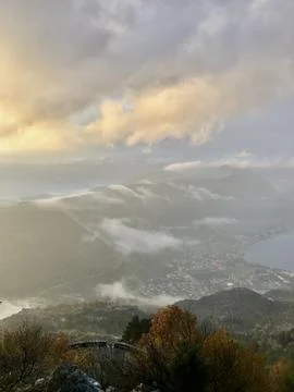 Fog in the mountains at sunset time Stock Photos