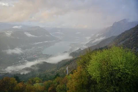 Fog in the mountains at sunset time Stock Photos