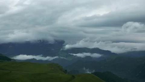 Fog in the mountains at sunset timelapse. Stock Footage 219569619