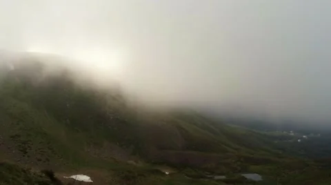 Fog moves in the camera, the view from the top of the mountain, overcast Stock Footage 40743812