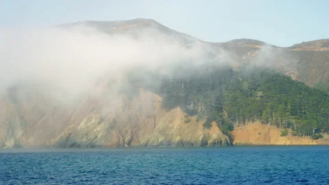 Fog moves over the Marin Headlands coastline in San Francisco Bay Stock-Footage 242829578