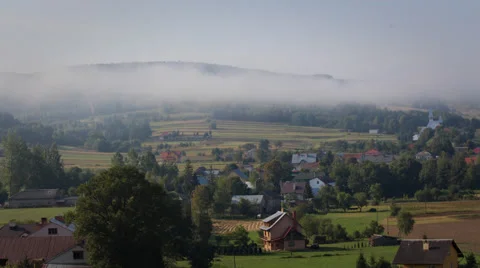 Fog moving across a hill Stock Footage 56514411