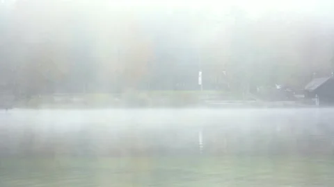 Fog moving on the surface of Bohinj Lake, Slovenia Stock Footage 169745693