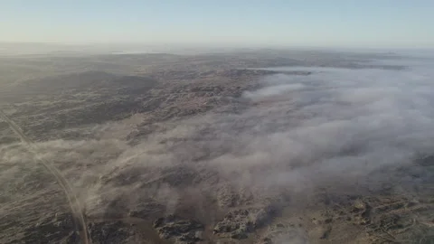 Fog over the desert in Namibia luderitz Stock Footage 264020645