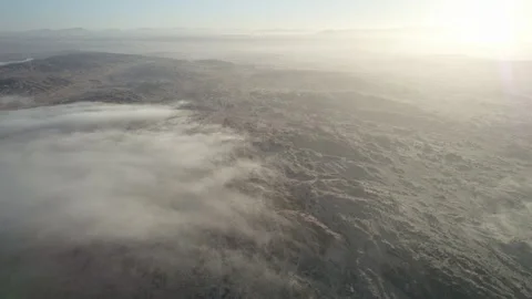 Fog over the desert in Namibia on a sunset Stock Footage 263412160