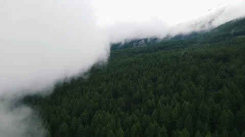 The fog over the hills is approaching. Drone footage Video stock 165967019