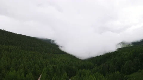 The fog over the hills is approaching. Drone footage Stock Footage 166062129