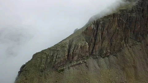 Fog over huge ridge Stock Footage 86480227