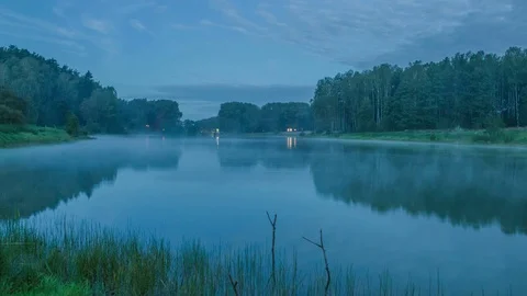 Fog over the lake. Night time Stock Footage 70861726