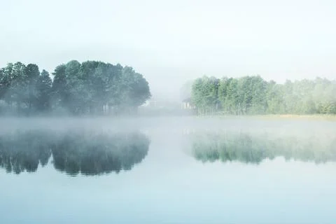 Fog over the lake Stock Photos