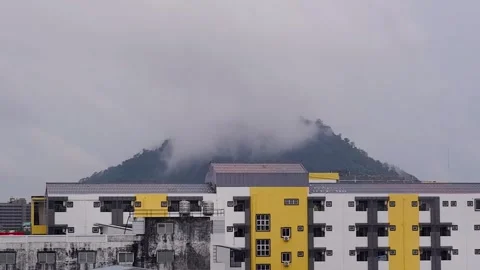 Fog over the mountain and the building Stock Footage 256866823