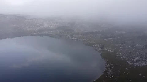 Fog over mountain lake Stock Footage 312063451