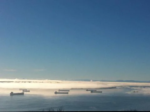Fog over the ocean Stock Photos
