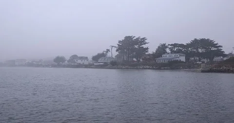 Fog over Pacific Ocean in Half Moon Bay by San Francisco, barely visible coast Stock Footage 139434128