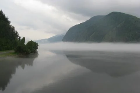 Fog over the river Stock Photos