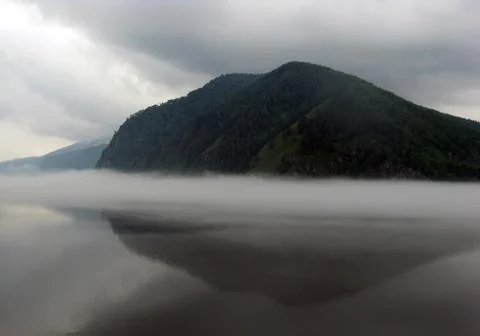 Fog over the river Stock Photos