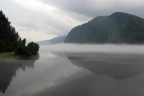 Fog over the river Stock Photos