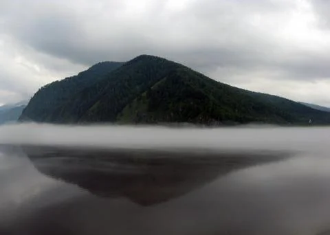 Fog over the river Stock Photos