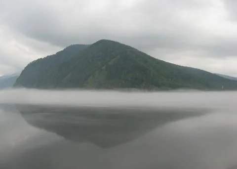 Fog over the river Stock Photos