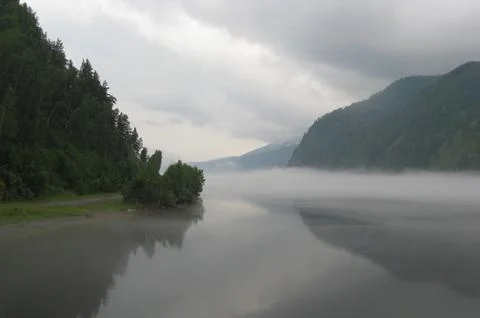 Fog over the river Stock Photos
