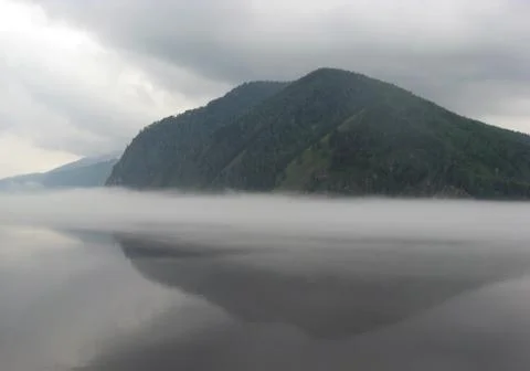 Fog over the river Stock Photos