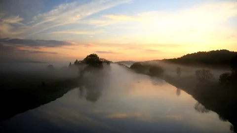 Fog over the river at sunrise. 스톡 동영상 81661567