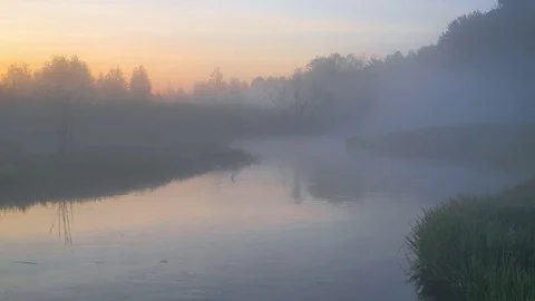 Fog over the river at sunset Stock Footage 76054965