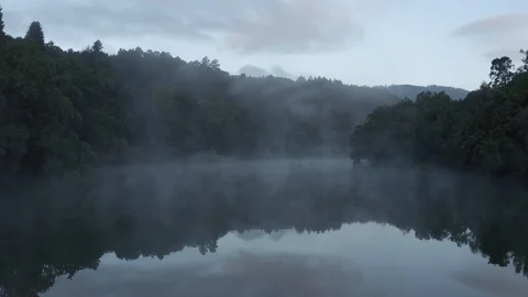 Fog Over Still River Drone Stock Footage 128361362