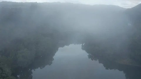 Fog Over Still River Drone 3 Stock Footage 128364809