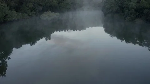 Fog Over Still River Drone 2 Stock Footage 128366014