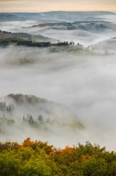 Fog over a valley 4 Stock Photos
