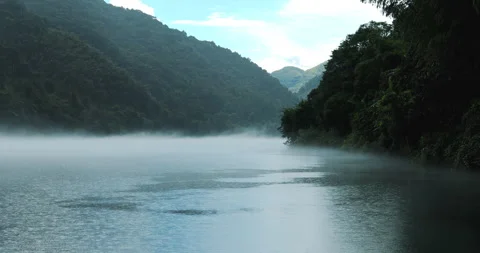 Fog overflowed the Xiaodong River Stock Footage 295584631